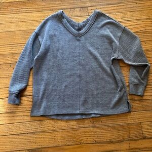 Grey V neck sweater, Size M, brand is SO.